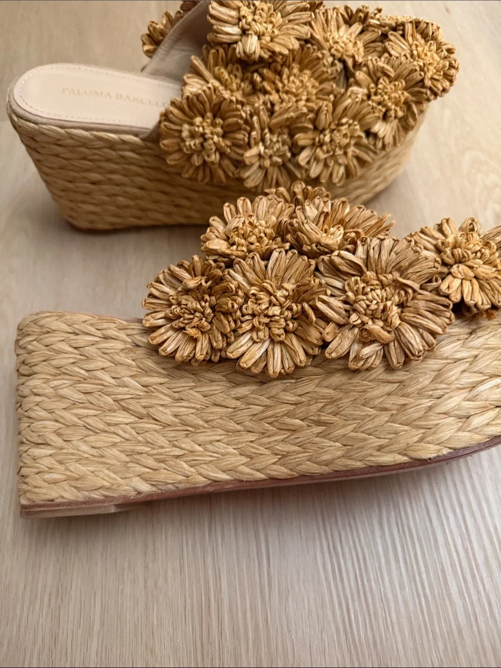 Paloma Barceló Natural Raffia Wedge Slides with Pom-Pom Detail